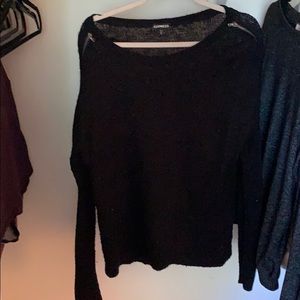 Express black sweater with zippers on sleeves.